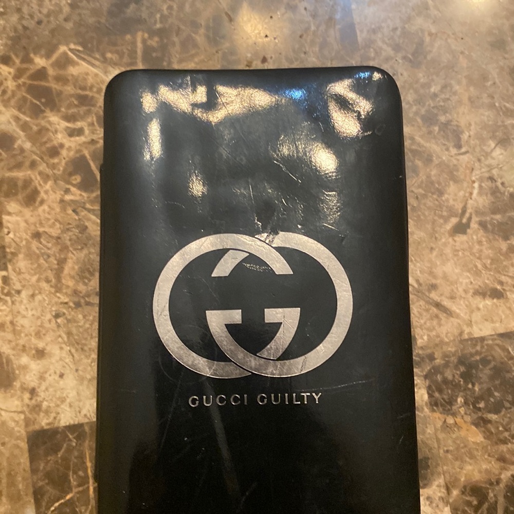Gucci guilty case zipper part is off but it will still zip